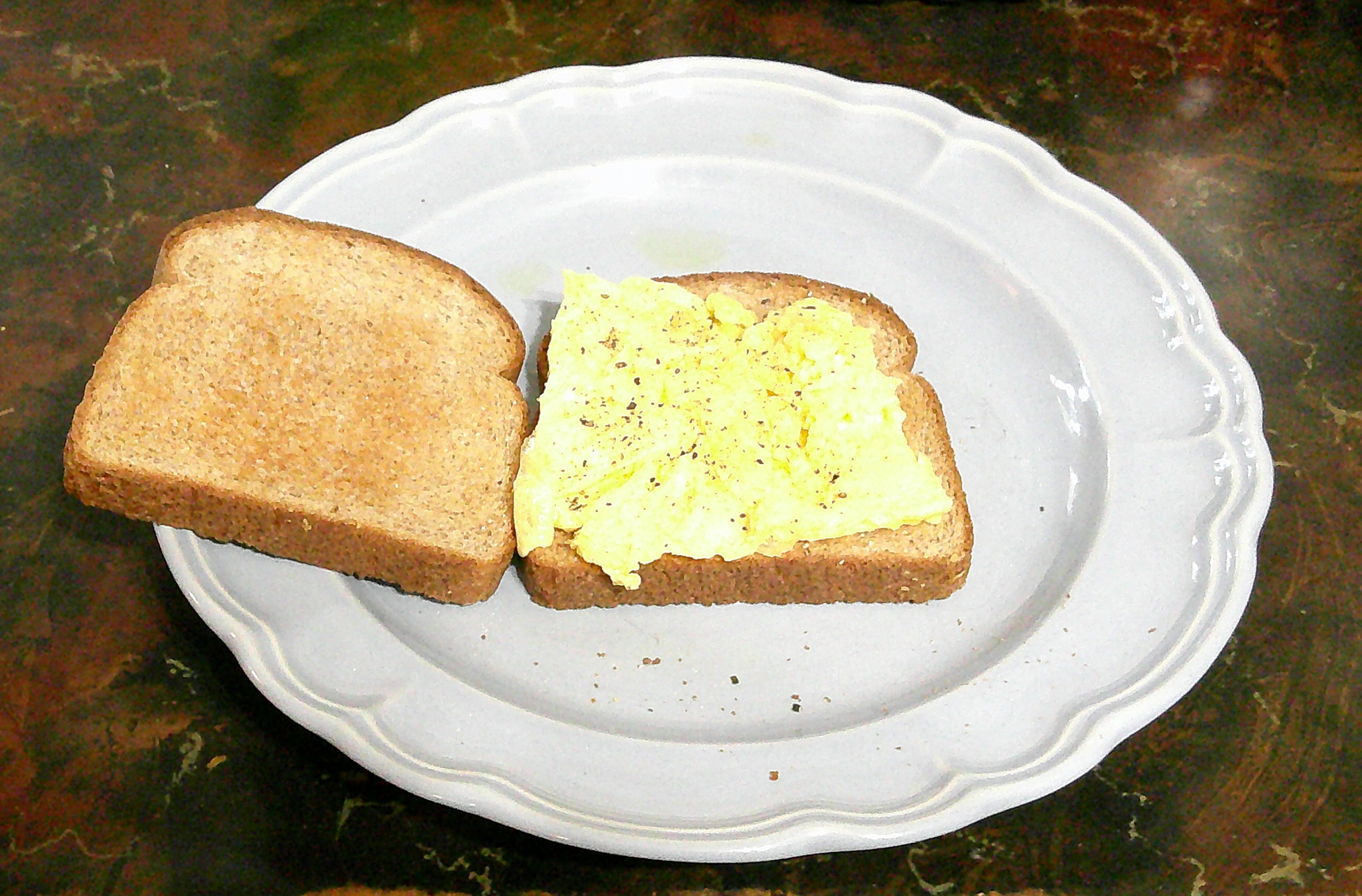 plate with egg on toast